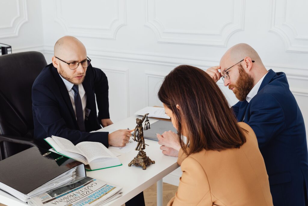 a visual representation of a scene inside a law firm talking about when should you seek legal consultation