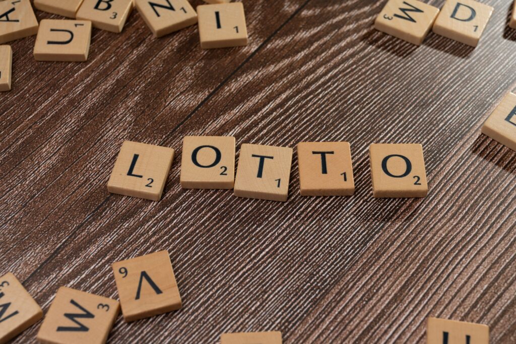 letters of scrabble composing the word lotto for the article lottery winnings after separation