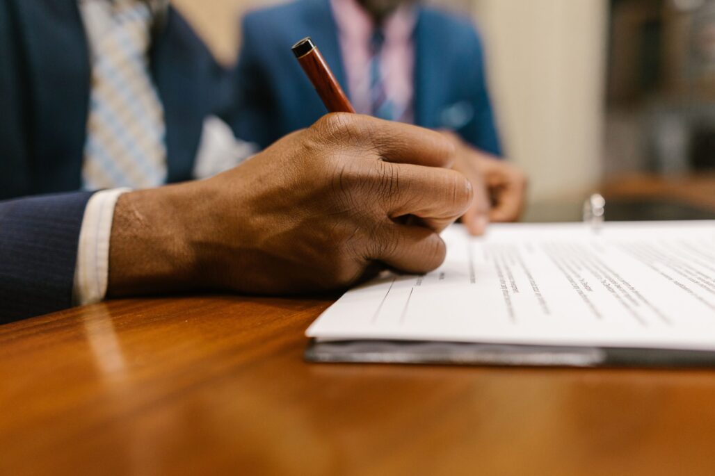 consent order vs bfa representation through a picture someone signing a document about that topic
